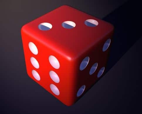 Red game dice with number 3