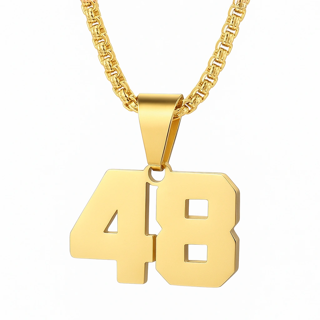 A gold necklace with a shiny pendant shaped as the number 48, featuring a bold, modern design and hanging from a thick gold chain on a white background.