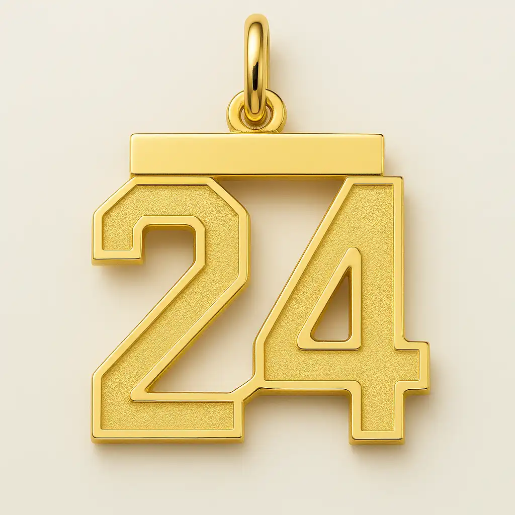 A photograph presents a gold pendant in the shape of the number 24, designed with bold, angular lines and a brushed matte finish, hanging from a polished loop.
